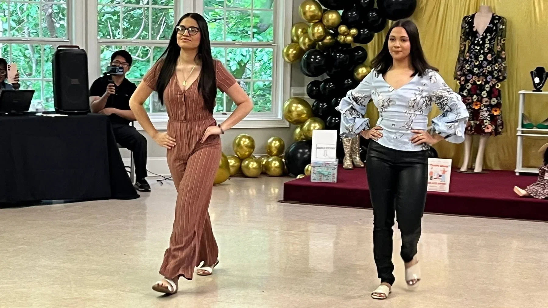 Models on the runway at the Thrift Shop fashion show.